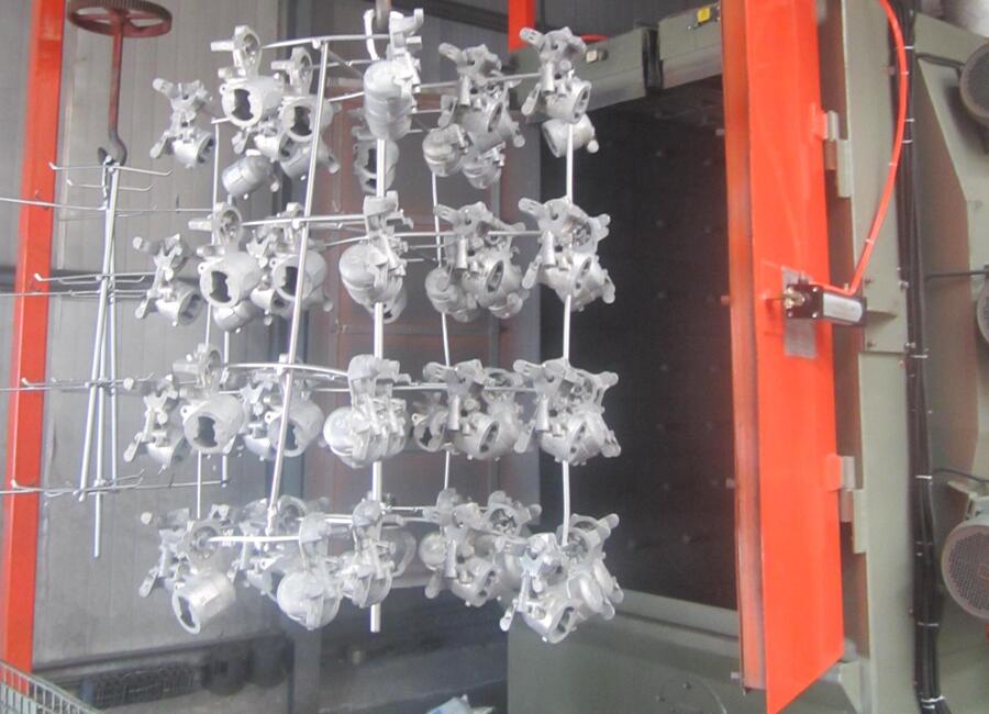 Spinner hanger hook type shot blasting machine